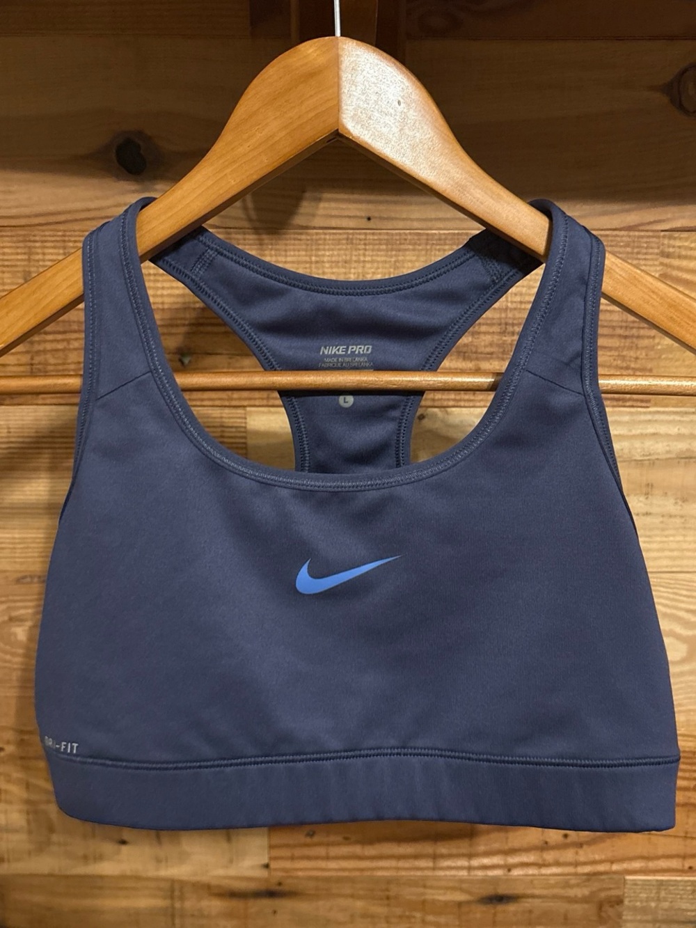 Nike Women's Navy Sports Bra with Light Blue Swoosh